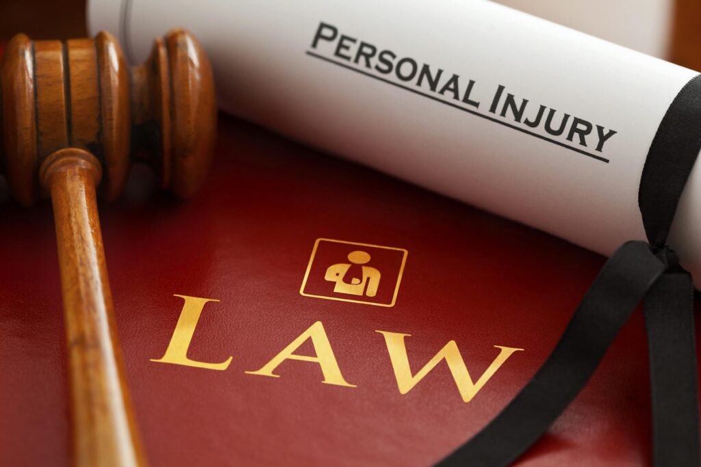Personal injury law document with a judge's gavel, representing legal representation for accident and injury claims.